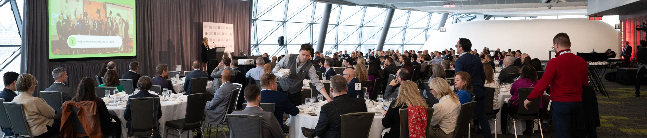 Ottawa Board of Trade members watching a presentation at a business conference