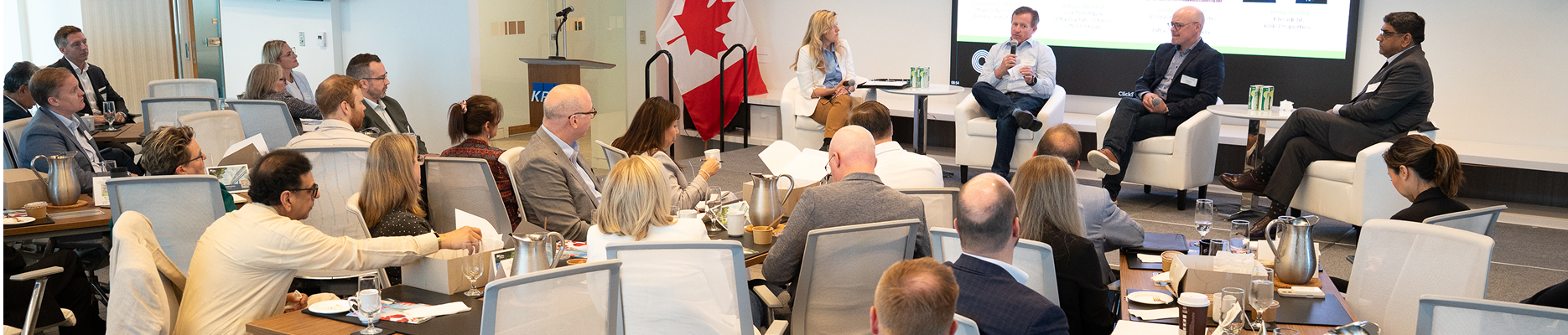 Ottawa Board of Trade partners meeting in a large conference room.